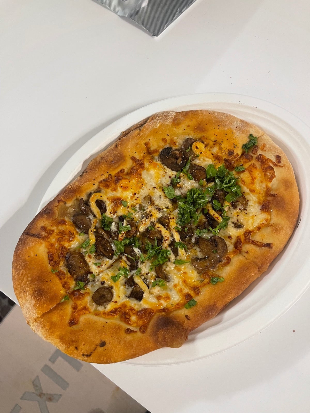 Wild Mushroom and Garlic Pizza at OceanView, Scholar's Pizza (community photo).